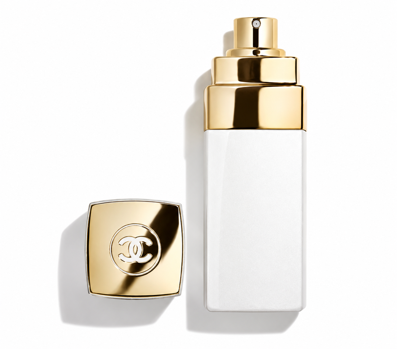 Chanel Coco Mademoiselle Eau de Parfum bottle with a sleek frosted white rectangular design, luxurious gold spray collar and cap featuring the iconic Chanel double-C logo.