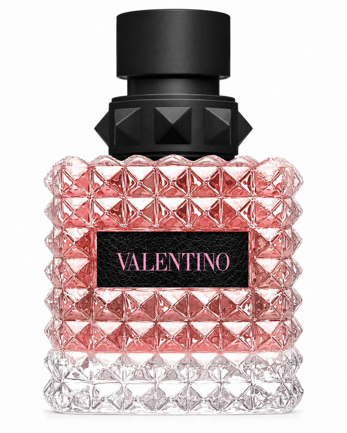 Valentino Donna Born in Roma Eau de Parfum bottle isolated on a white background, featuring a faceted pink gradient glass bottle with the iconic Rockstud design, matte black studded cap, and black Valentino label, showcasing its elegant couture-inspired aesthetic.