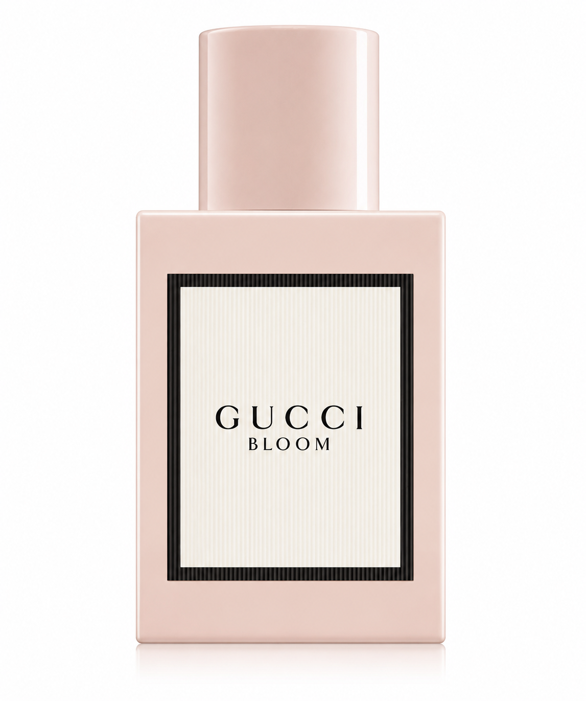 Gucci Bloom Eau de Parfum bottle isolated on a white background, featuring the iconic blush pink rectangular bottle with a matching cylindrical cap and a minimalist black-framed Gucci Bloom label.